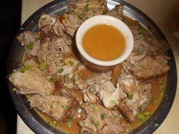 Roti de porc au rhum et a l'orange