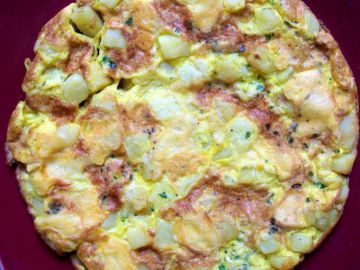 Frittata aux pommes de terre, galbanino et persil.
